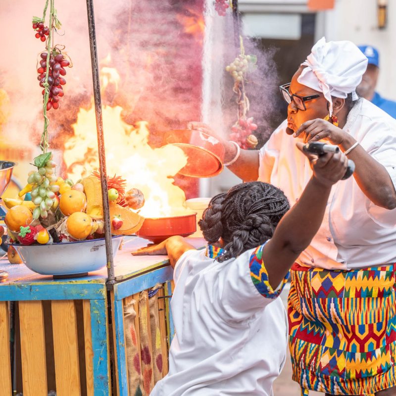 International touring contemporary circus artist Blaze and touring circus chef/clown Fatina are a mother and daughter duo. Join them on a joyous journey of a plate spinning, food juggling and fire blazing!
